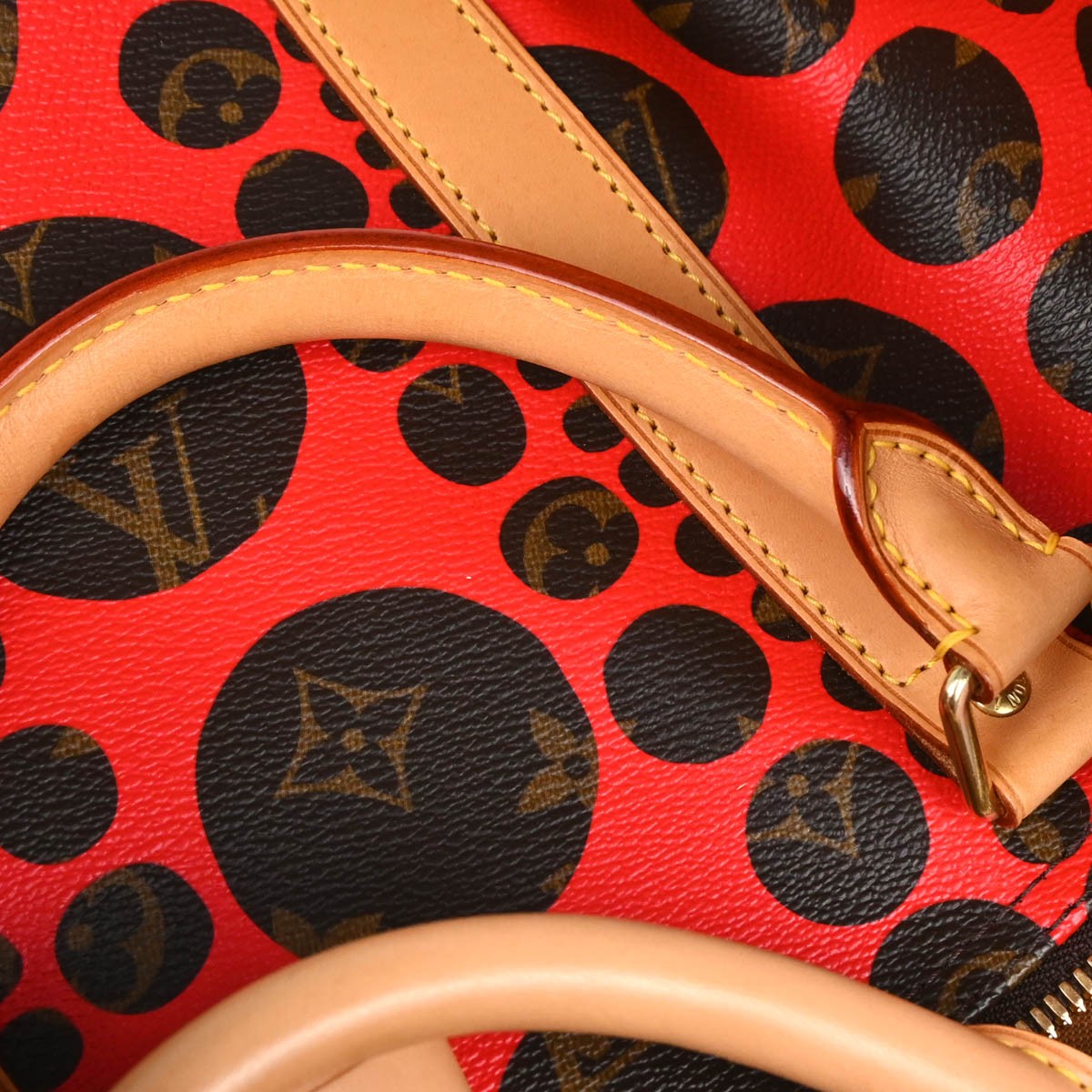 Louis Vuitton 2012 Pumpkin Dot Keepall Bandouliere 55 Duffle Bag M40695