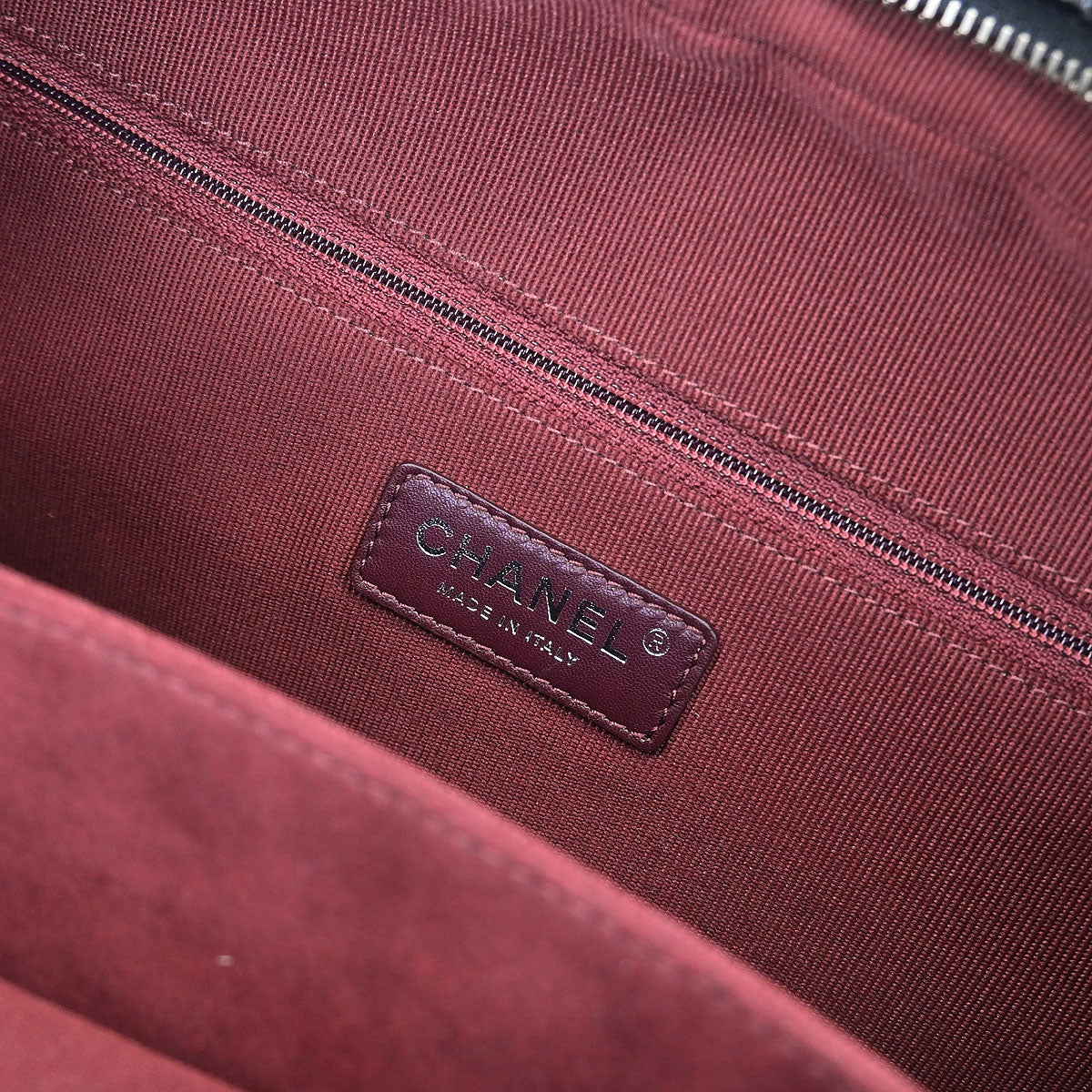 Chanel 2014-2015 Black Patent Leather Duffle Handbag